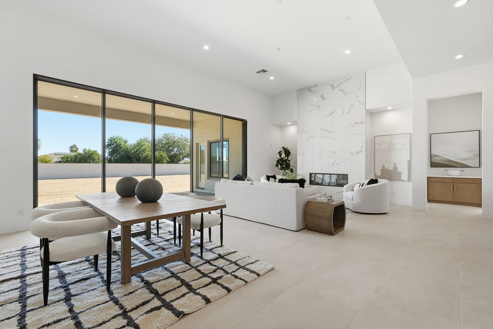 Modern open concept with marble fireplace