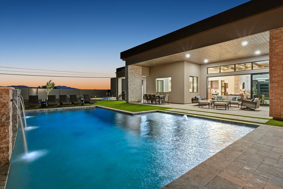 Twilight pool with fountains